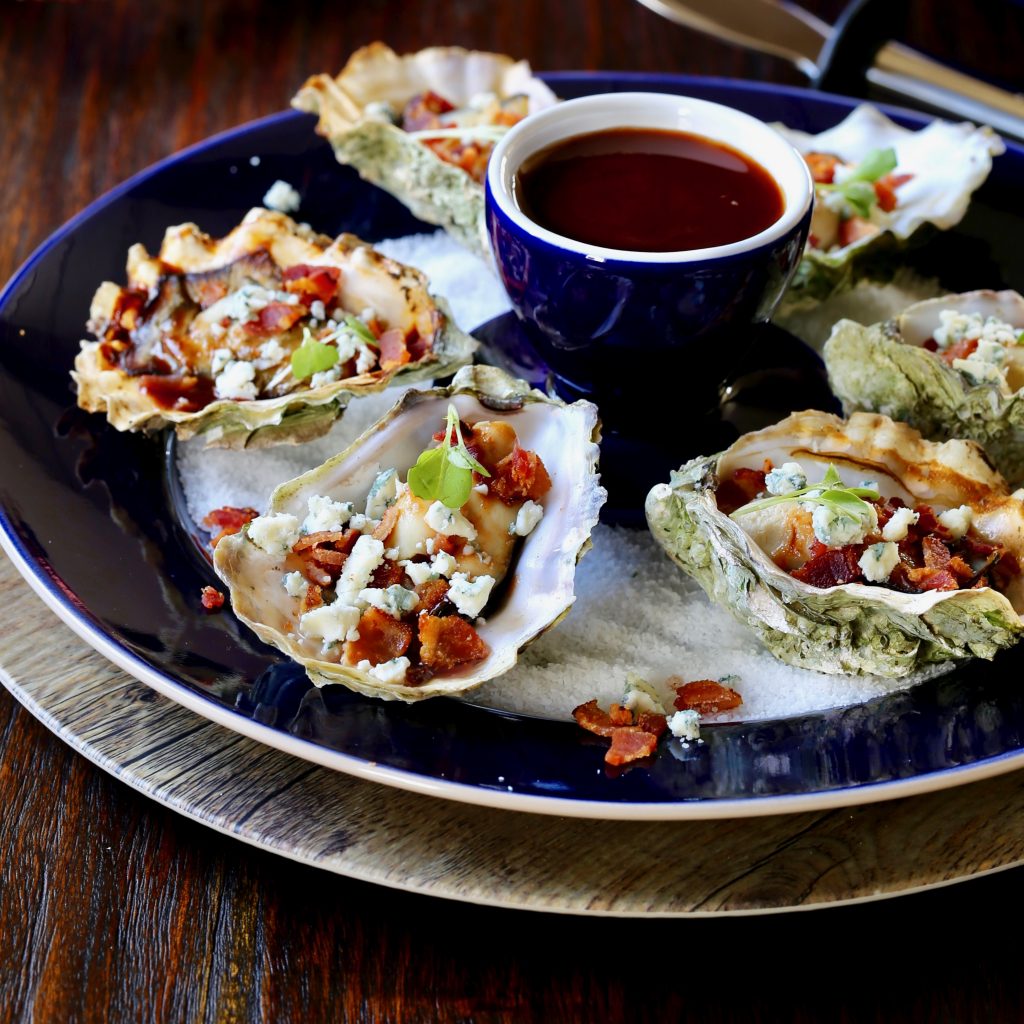 Grilled Oysters with BBQ Sauce and Bacon and Bleu Cheese