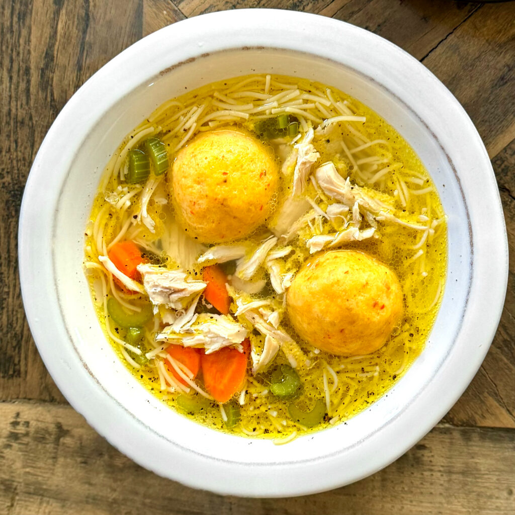 Chicken Noodle Soup with Calabrian Chili Matzoh Balls