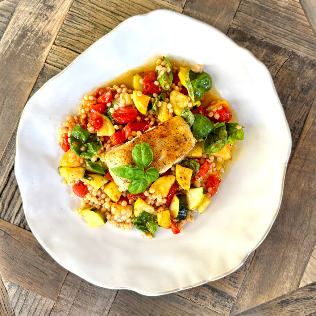 Chilean Sea Bass over Summer Vegetable Couscous