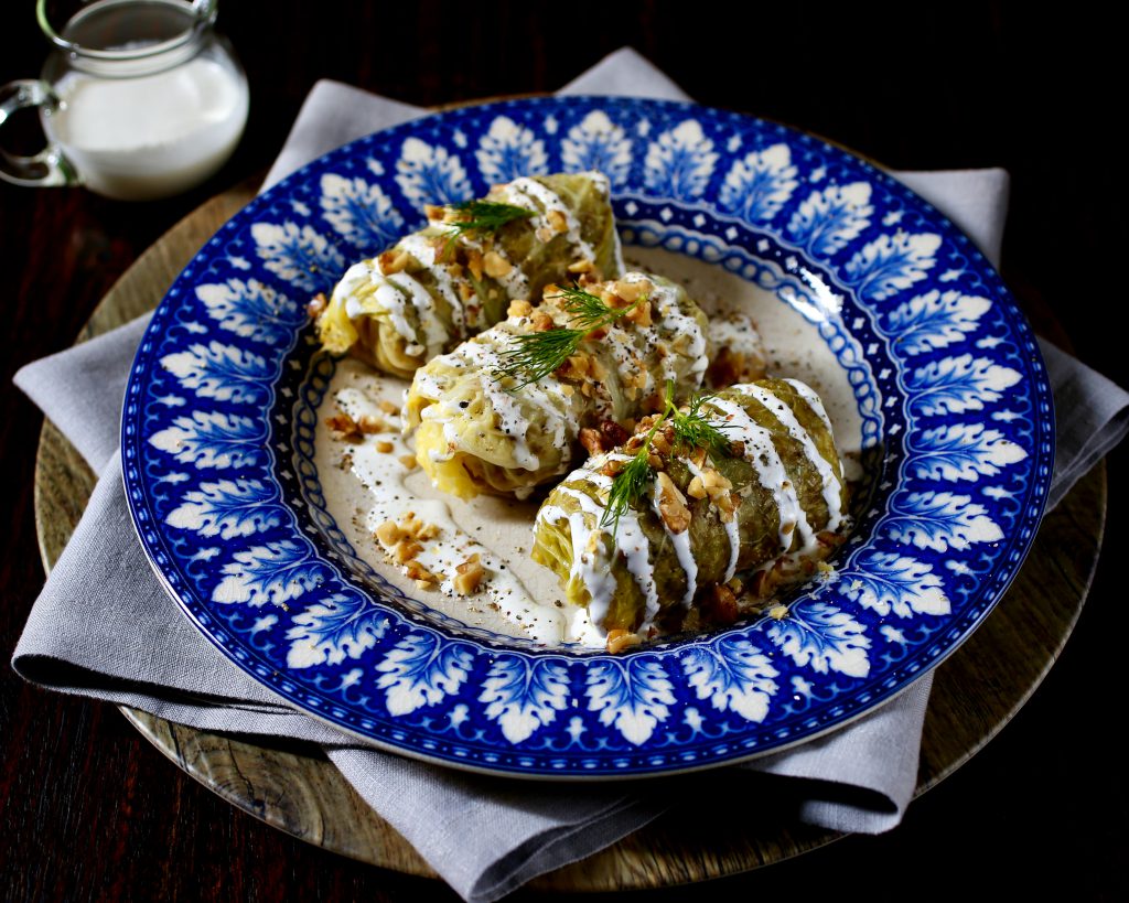 Stuffed Cabbage with Mexican Crema and Walnuts